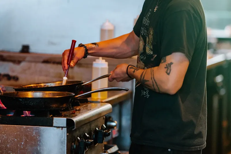 Breakfast being cooked to order in the Sociology kitchen